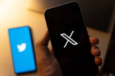 This-image-represents-the-former-Twitter-logo-and-the-new-Twitter-logo-projected-via-two-diffe...jpg This-image-represents-the-former-Twitter-logo-and-the-new-Twitter-logo-projected-via-two-diffe...jpg